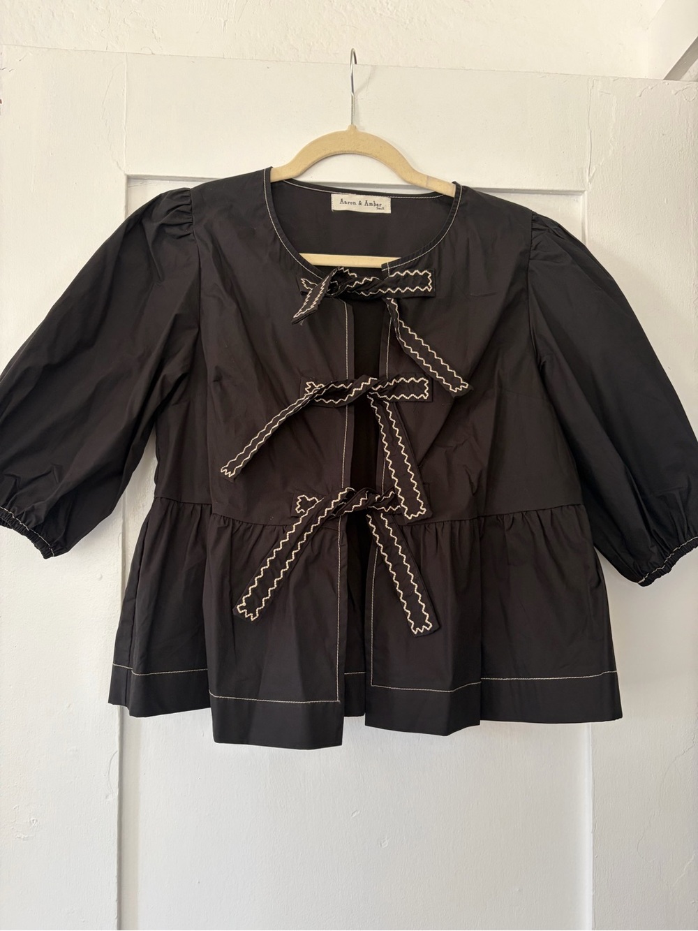 Black Poplin Puff-Sleeve Tie-Front Peplum Top